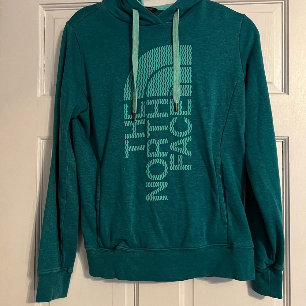 Teal and aqua north face hoodie size M.